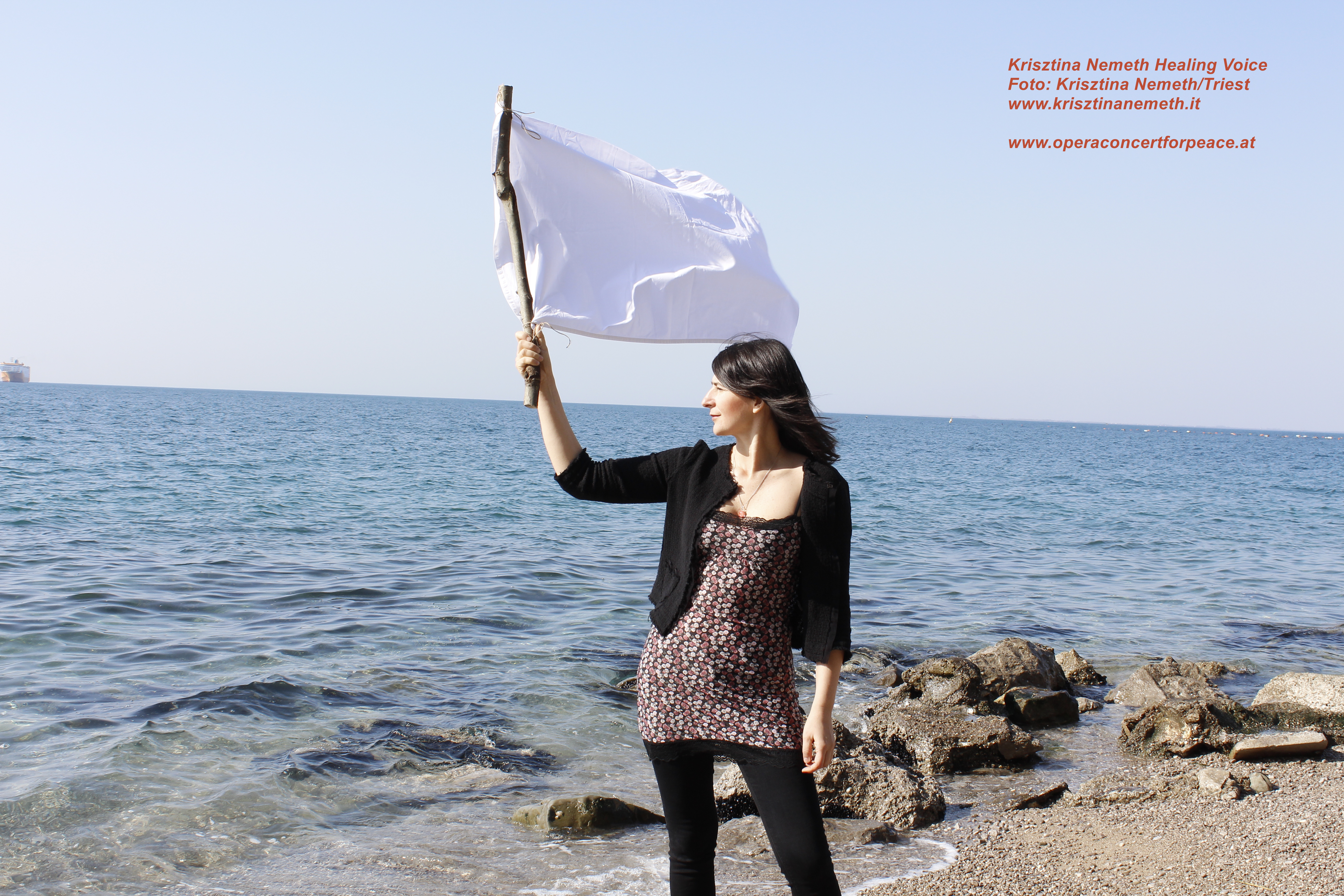 Krisztina Nemeth wave the Peaceflag in Triest. Grazie mille a Trieste.﻿